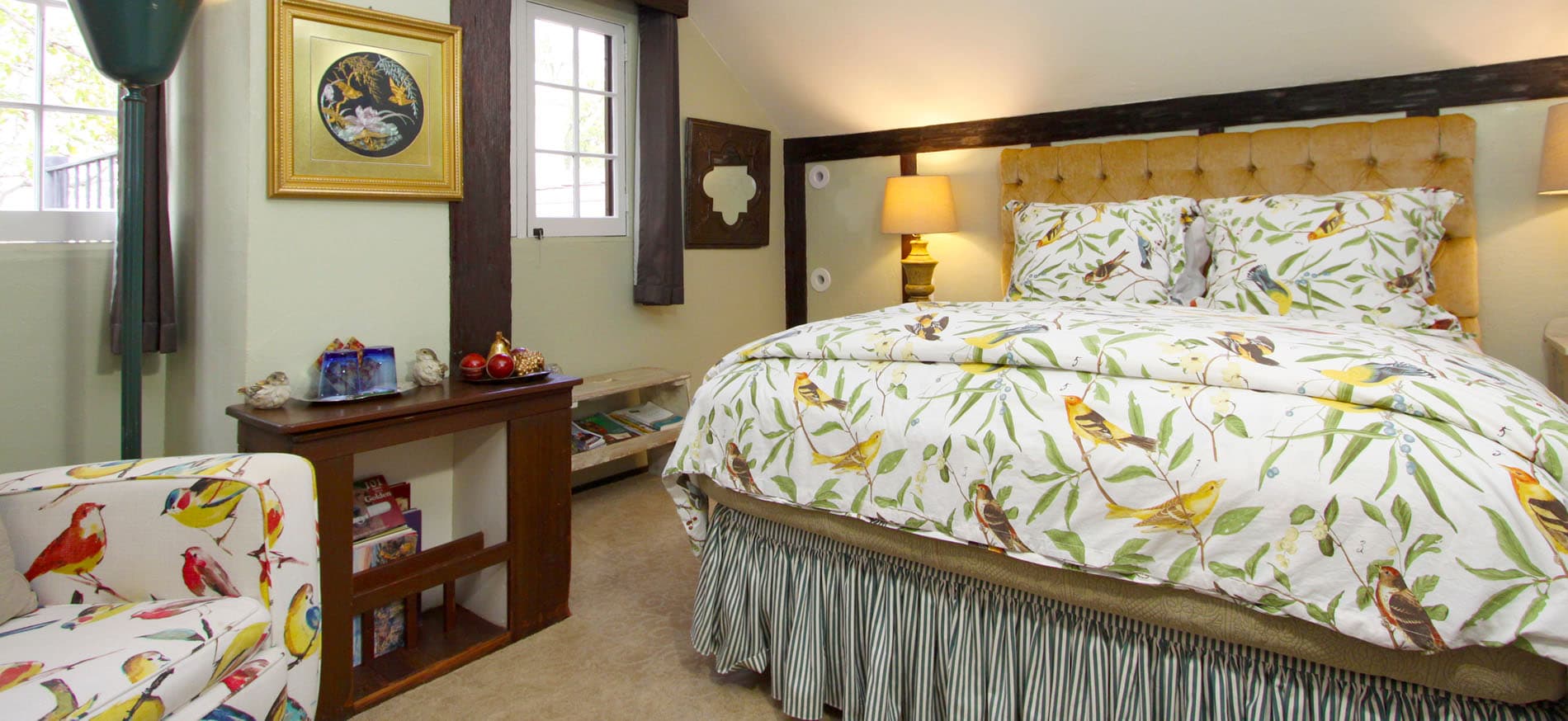 Rookery room with fireplace and chairs