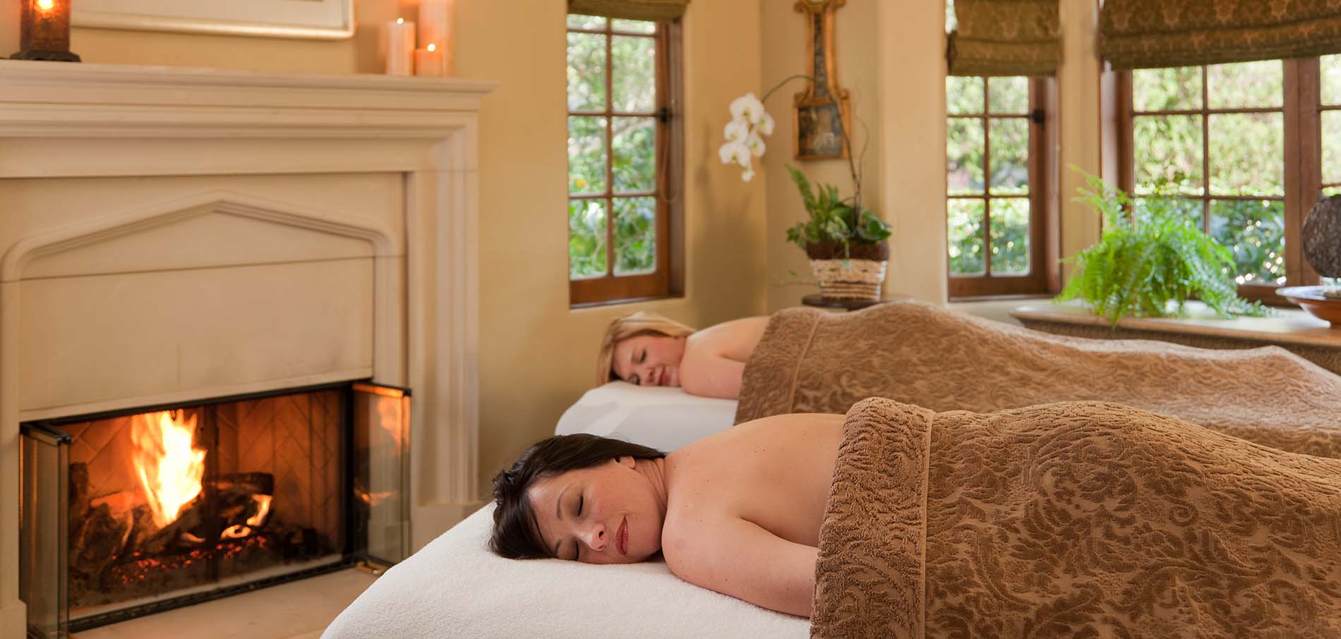 spa services at old monterey inn two woman on massage tables