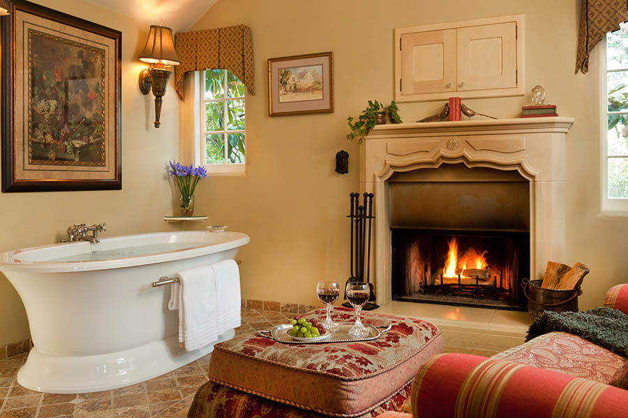 romantic suite with tub near fireplace