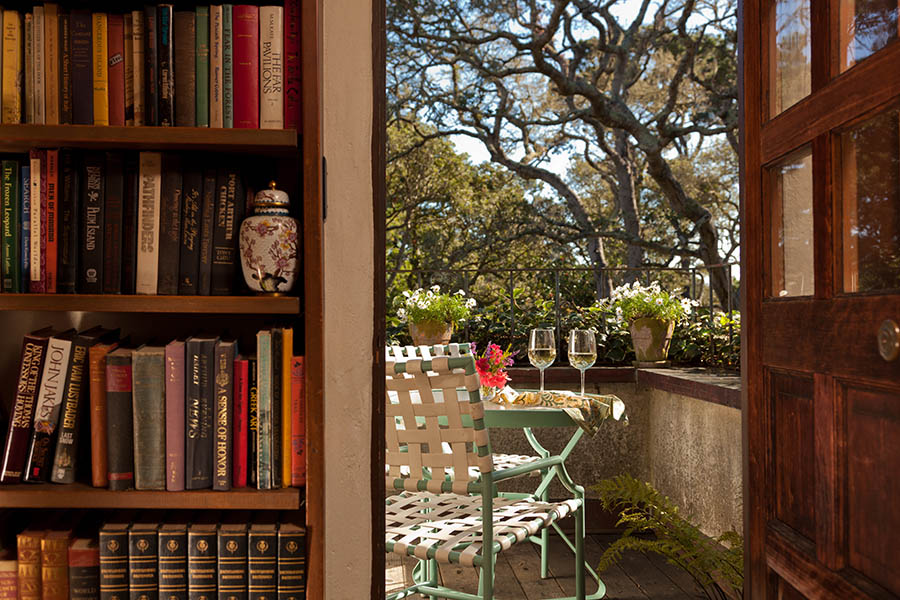 library room at monterey inn with bed and chairs