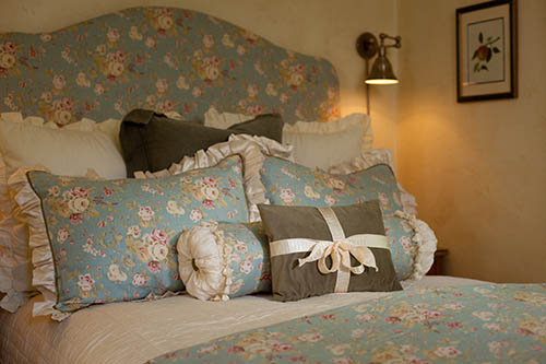 romantic suite with bed and beautiful pillows