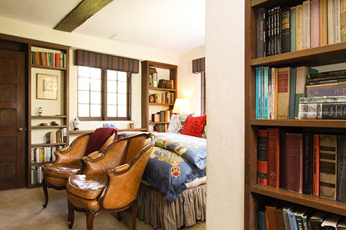 library room at monterey inn with bed and chairs