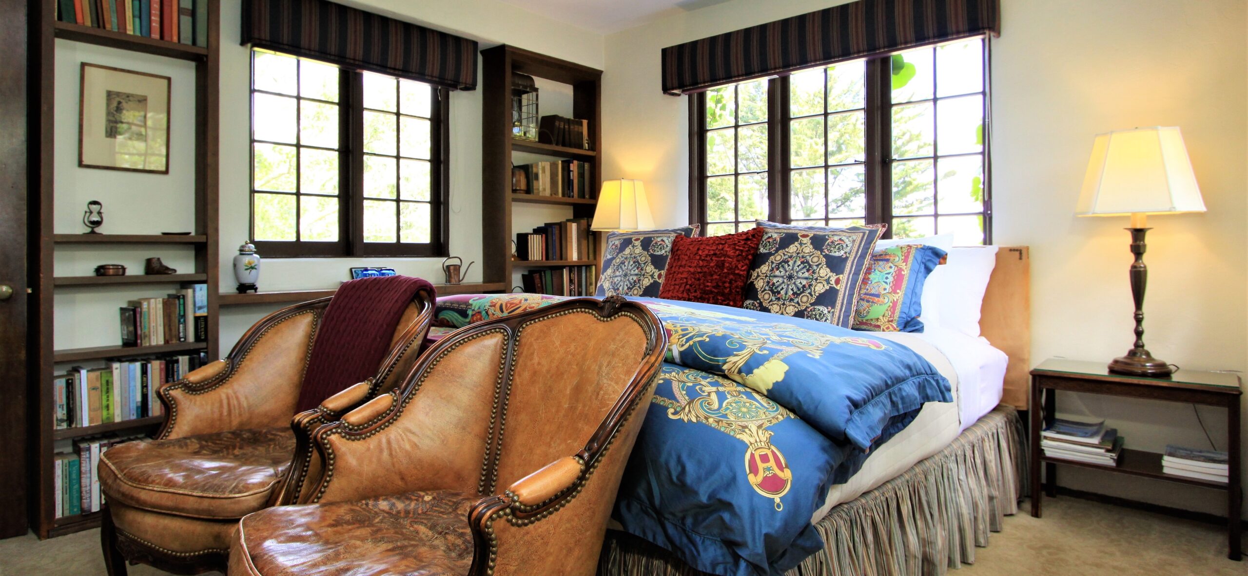 library room at monterey inn with bed and chairs