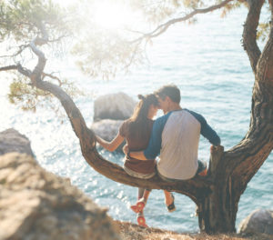 Couple by the water enjoying romantic things to do in Monterey