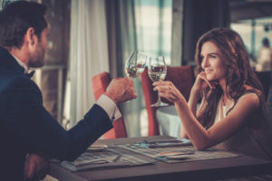 Couple having romantic dinner at a Monterey, CA Restaurant